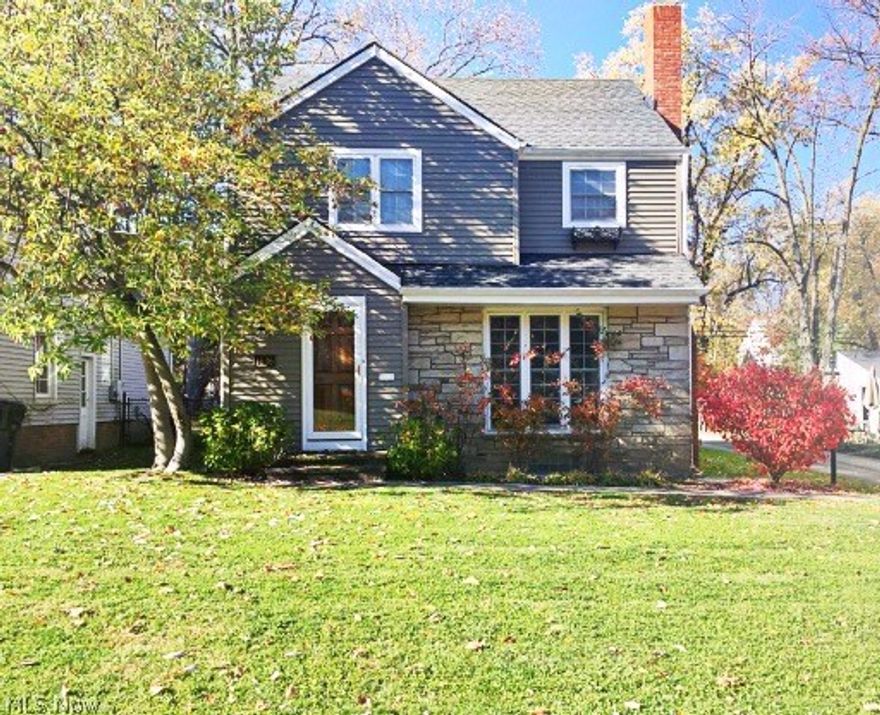 Don't miss out on this beautifully updated colonial, located on a highly sought after street in a lovely neighborhood.  This house boasts elegance.  Spacious Living room features fireplace, wonderful natural light and NEWLY refinished hardwood floors.  The gorgeous Dining room is complete with NEWLY refinished hardwood floors, crown molding and built-in custom cabinetry.  The NEWLY remodeled kitchen features custom cabinets, granite counter tops, new sink and fixtures, tiled floors and recessed lighting.   NEWLY redone entry way complete with built in storage bench and a half bath.  The second floor has three great bedrooms, and a NEWLY renovated full bath.  Spacious master bedroom w/ carpet & hardwood underneath, includes a closet with access to the insulated attic.  Exterior updates include NEWER siding, NEWER roof w/ power roof vent,  NEWER windows and a wonderfully maintained yard w/ sprinkler systems in both the front and back yards, including an in-ground hose storage box.  Pull