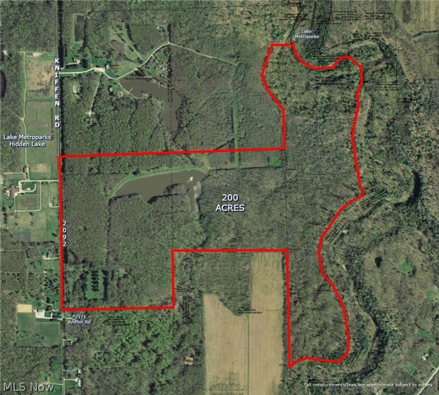 6 Acre lake, waterfall, outstanding views of valley near Hell’s Hollow and Hidden Lake Metroparks.  200 acres with 2092 feet of frontage, formerly part of Camp Lejnar Girl Scout Camp.  Waterfall on Phelps/Bates Creek is shared by Lake County metroparks land.  Nice two story block building as well as a old one room log cabin.  Wildlife galore.