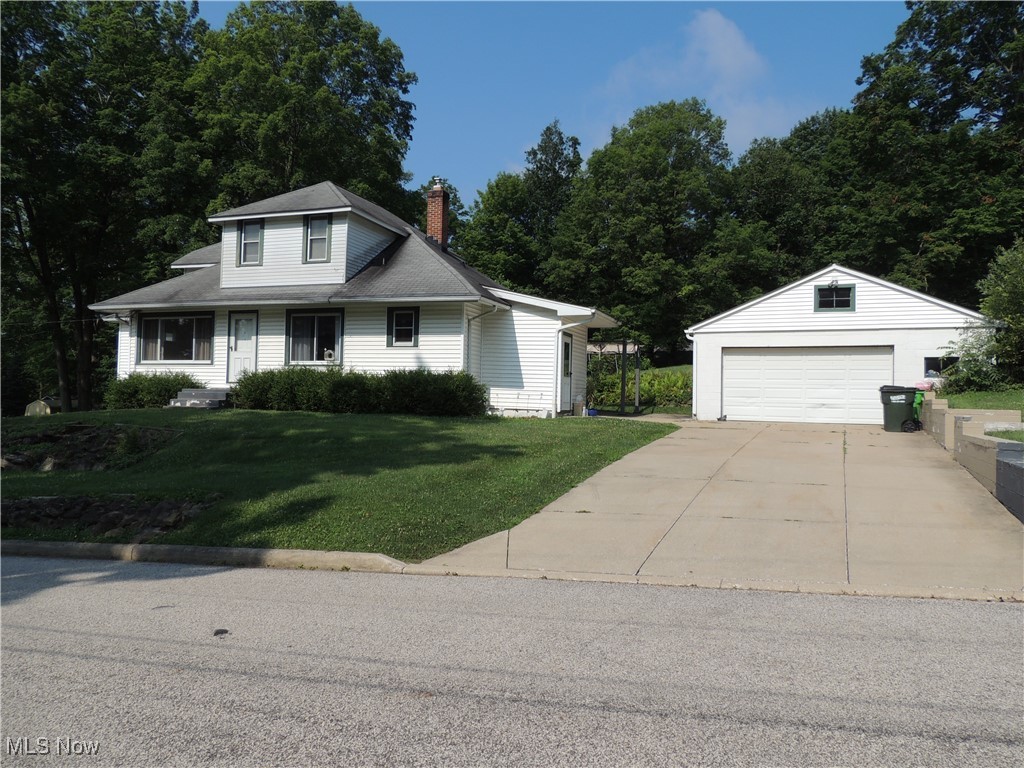 Welcome to the quaint village of Mantua to this well cared for home that offers 4 or more bedrooms, 2 full baths an attached one car garage plus a detached two car garage , all on a parklike half acre lot. Home offers a separate suite or rental apartment on one side or just keep home open for full usage as a large single family. Location can't be beat with city utilities and walkability to town and schools.