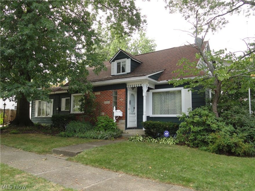 Charming Cape in desirable Cuyahoga Falls location. Formal living and dining rooms, updated kitchen with newer appliances, laminate floors, breakfast bar, overlooks spacious family room with fireplace. Beautiful hardwood floors in most rooms, two bedrooms on first floor with full bath and a huge second floor bedroom with walk in closet. Nice rec room in lower level plus second full bath. Attached garage plus fenced patio area. Newer roof, water heater, furnace & AC too. This well built home with great floor plan has been well maintained for many years.