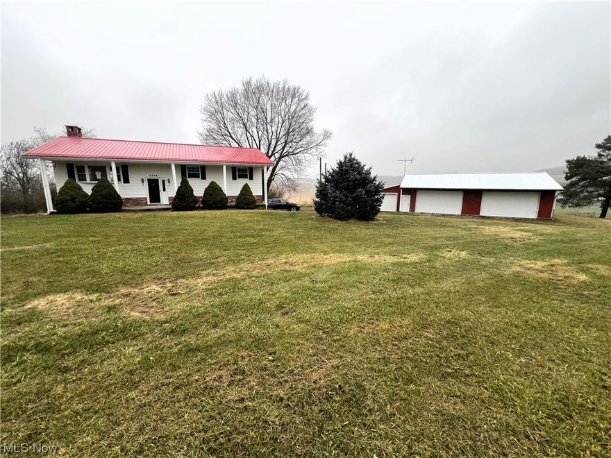 HUD home selling AS-IS. Split-level home with a walk-out finished basement on 2 acres. Upstairs consists of three bedrooms, a full bathroom, a living room, an eat-in kitchen, and a dining area. The full bathroom is a "Jack and Jill," which can be entered from the hallway or the master bedroom. The living room features a bay window. Off the dining area is a large deck that measures 46' x 12" with stairs to the backyard. Downstairs has a family room, laundry room, office, half bathroom, and a two-car attached garage. The detached garage was built in 2005 and measures 32' x 40'. The detached garage has a 100 amp breaker box, heat, air conditioning, water, and auto door openers. The shed/barn measures 12' x 24'.