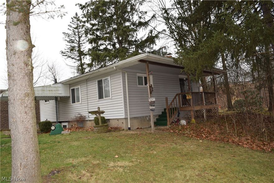 Easy one floor living in this 2 bedroom ranch with 1st floor laundry. Open living room and dining room with corner cabinet. Main bath has a walk-in shower. 2.2738 acres surrounds this home for privacy. Walk-out basement. Owners have loved their home for 70 years.