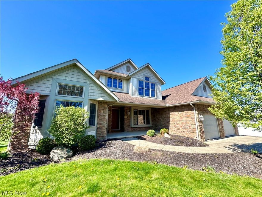 Welcome to 142 Pleasant Valley, Sugarcreek where the name suits the charm!  The front windows overlook ‘pleasant’ views of Ohio’s favorite Little Switzerland while the back 14x30 deck boasts peaceful, rolling farmland, complete with horses frolicking and postcard-worthy sunsets. This Ivan Yoder custom built home features 3 spacious bedrooms, 3.5 baths, 2 fireplaces, upstairs loft, and finished walkout basement. The 1st floor master suite not only allows retreat into your ‘own space’ but keeps everyone happy with double closets, soaker tub, shower, and double counter space areas, allowing ample elbow room. The beautiful eat-in kitchen makes a culinary statement with matte white and copper GE Cafe appliances, Schrock cabinetry, quartz countertops, island, and views that will almost make you want to do dishes. The vaulted ceiling living room, office, half bath, and storage-friendly laundry room complete the first floor of this charming home.  The walk out lower level features 2 bedrooms, 2 full bathrooms, family room, work out room, and storage. If the outdoors are what you need, meander out to the 14x32 patioand enjoy your view. If activity is on your want list, take a walk around the sizable backyard, or shoot some hoops on the half basketball court. This property literally has something for every type of individual, so come see how many of your needs are impeccably met by all its features!