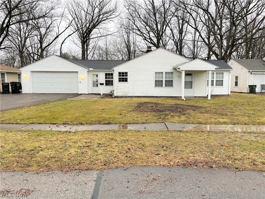 Move in ready!  This Elyria ranch is all spruced up and ready for YOU!  Freshly painted this home has 3 bedrooms and 1 bathroom.  The kitchen has lots of cabinets and lots of counter space.  All the flooring looks great.  The spacious living room has a fireplace.  There is also a large family room with a patio door that leads to a deck and a beautiful back yard that has a ravine. It has replacement windows and a 2 car attached garage off the family room.  The garage has a separate workshop attached.  Come and see this wonderful home today.