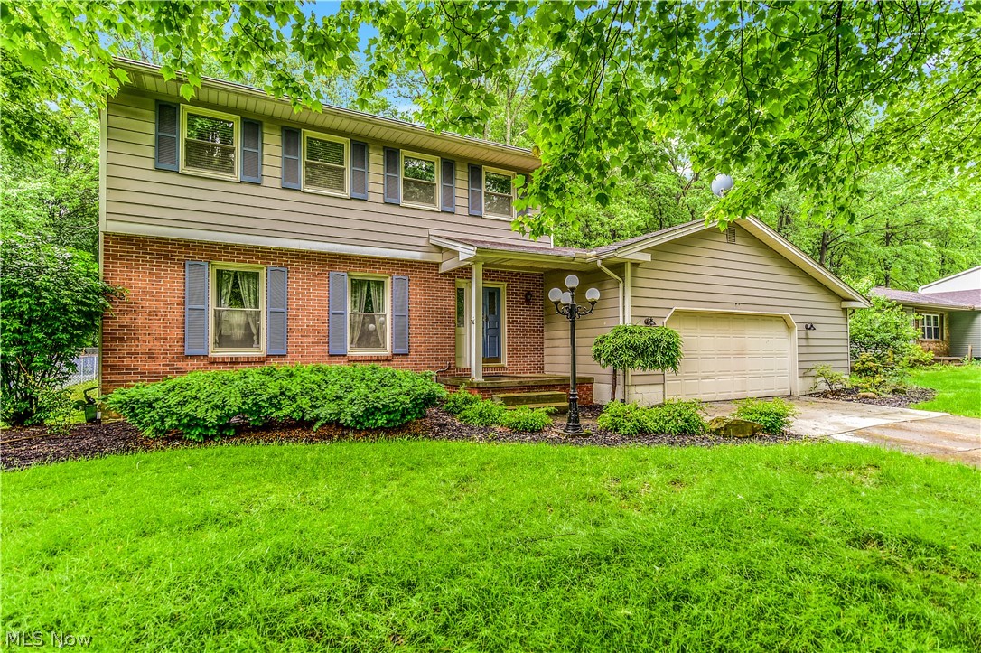AWESOME 3 Bedroom, 3 & 1/2 Bath UPDATED Colonial in Desirable Neighborhood. Home Features Include: Awesome Front Living Room, Back Family Room with Gas Fireplace & Built In Bookshelves, LARGE Eat In Kitchen with New Cabinets, Formal Dining Room, & Half Bath. Second Floor Offers a Large Master Bedroom with Master Bath, 2 other Large Bedrooms, & 2nd Full Bath. Lower Level has been recently updated with Stunning Manufactured Hardwood Floors, Bar Area, Full Bath, & Large Rec. Room Area. The Sliding Doors off the Family Room lead to an Awesome Covered Porch that leads to a Private Fenced Back Yard with Scenic Park Like Setting. Updates Include: Updated Kitchen, NEW Finished Basement, New Garage Floor with Drain & Side Walk, New Central Air - 2017, New Hot Water Tank - 2016, & a Fresh Coat of Paint.