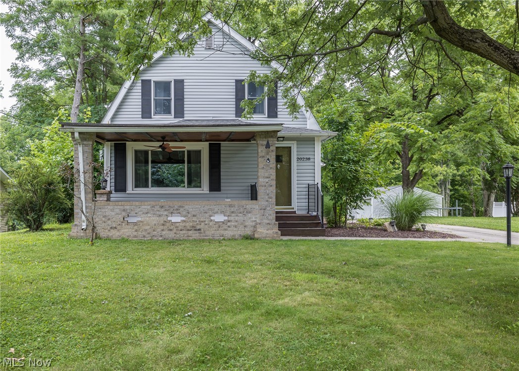Welcome home to 20238 Westwood Drive where city life meets country living. Located in the award winning school district of Strongsville and tucked away on .61 acres puts this home in an ideal location and setting. Upon entry you will immediately notice the openness this floor plan has to offer. Open eat-in kitchen boasts plenty of cabinets, countertop space, new flooring and plenty of natural lighting. Main level features a bedroom and updated full bath. Dedicated dining room space sits adjacent to the oversized living room area which overlooks the covered brick porch. Upstairs features two other nice sized bedrooms and a half bath. Relax after a long day on the patio that overlooks the expansive back yard. Detached two and half car garage. Chicken coup with chickens can stay or go. Easy access to major highways, shopping and dining puts this home in an ideal location. Hurry up and schedule your very own private showing because this gem wont last long.