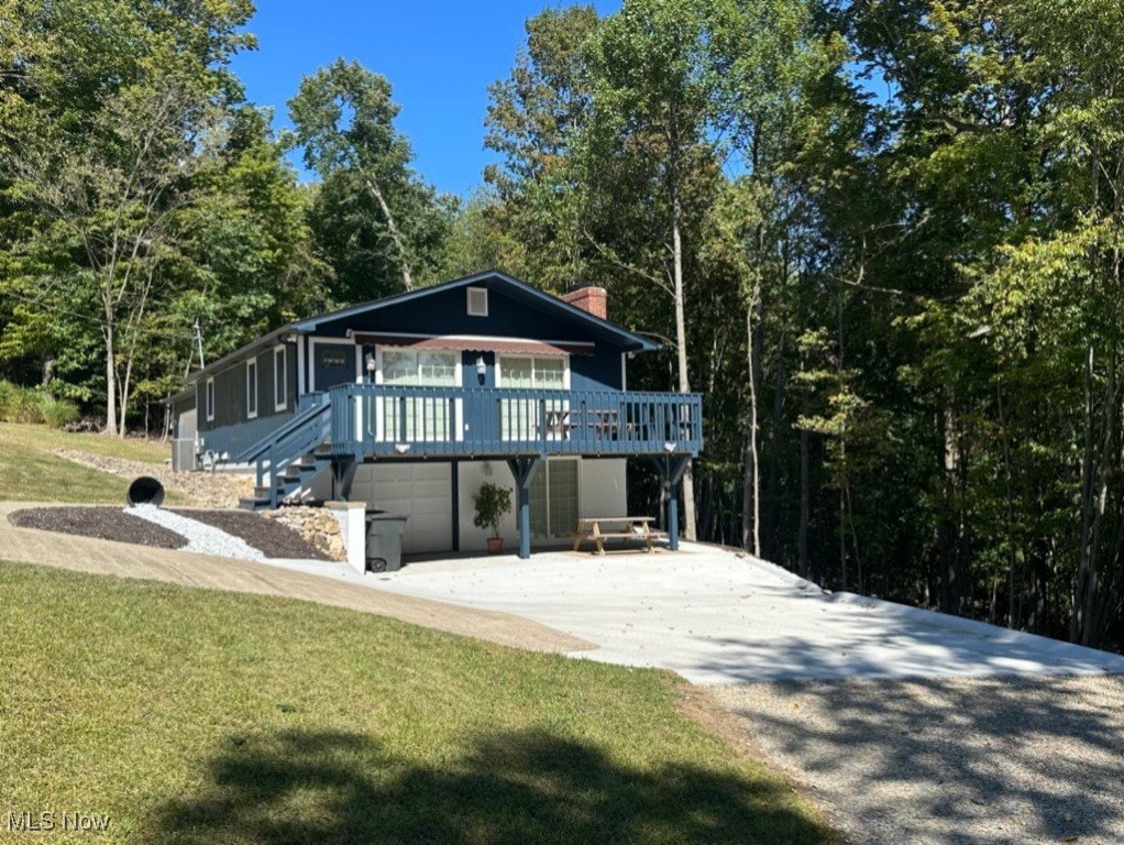 Welcome to this serene 3-bedroom, 2-bathroom residence located in the highly desirable Lake Mohawk community. Set on a spacious acre lot, the property is beautifully positioned against a backdrop of tranquil lake views and wooded surroundings, offering a perfect sanctuary for nature lovers and outdoor enthusiasts alike. The home features a well designed kitchen with ample storage and counter space, ideal for everyday cooking and entertaining. A finished walkout basement adds versatility with a cozy recreation room complete with a wood-burning fireplace, providing a warm and inviting space for gatherings or relaxation. Step outside onto the deck to enjoy unobstructed views of Lake Mohawk, where the peaceful ambiance can be appreciated year-round. Generous parking accommodations make hosting guests effortless, while the natural setting ensures a quiet escape from the demands of daily life. Residents of Lake Mohawk enjoy access to a wealth of amenities within this private, gated community, including a 500-acre lake, three pristine beaches, tennis and pickleball courts, a clubhouse for social events, and a scenic 9-hole executive golf course. Whether
you're seeking adventure or tranquility, this home offers the perfect blend of comfort, nature, and community living.