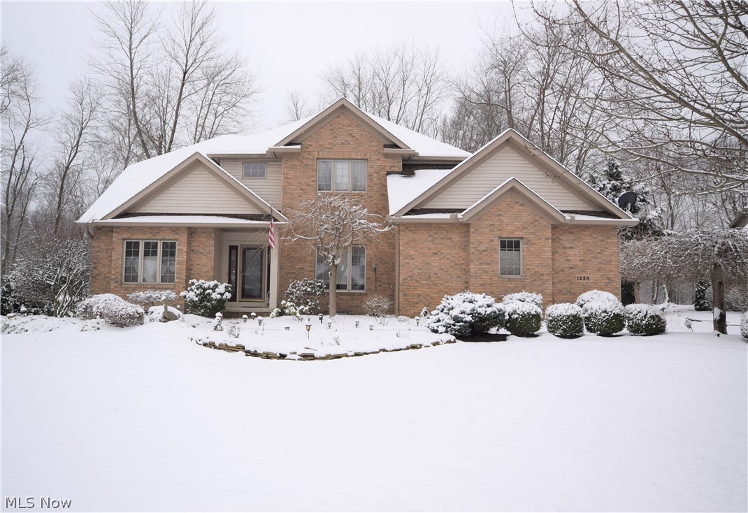 Welcome to 1238 Maxfli Drive in Akron! This beautiful 4-bedroom, 3-bathroom home is situated in Chenoweth Country Club Estates. Walk into
the front door to be greeted by the stunning two-story foyer! The eat-in kitchen has hardwood floors and gorgeous granite countertops. A large
island provides tons of extra storage space, as well as an extra seating area. Spacious living room has a fireplace and sliding glass doors that
lead to the back porch. The formal dining room offers a great place for dinners and entertaining. A bonus room is located right inside the front
door -- the perfect spot for an office, play room, etc. All bedrooms are huge with ample amounts of closet space! The Owners Suite bathroom has
convenient double sinks and a large Jacuzzi tub. Basement is clean and recently painted. This home has immaculate curb appeal with lovely
landscaping and a three-car attached garage. This home also features a newer roof, hot water tank, and interior paint. Schedule a private
sh