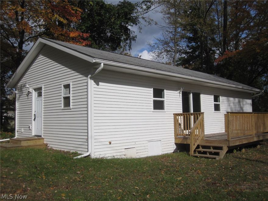 Live peace filled & simple in this renovated 2 BR 1 bath ranch home with views of Brady Lake.  Brand new kitchen with stainless steel appliances opens to dining & living room combo with sliders leading to spacious deck.  Remodeled bath with ceramic tile and all new fixtures.  Master bedroom with full wall closet and second bedroom complete the home.  New well 2017.  Property includes 3 parcels, plenty of room to build a garage or possibly another small home with approved variance.  Updated plumbing and electrical.  Affordable serene living, cheaper than rent!