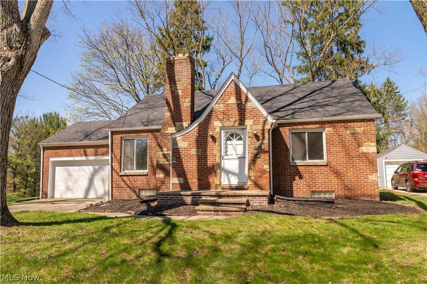 This fully renovated brick ranch features 2 bedrooms and 1 bath, sitting on 8.12 acres right in Akron. The home was completely gutted and refreshed with new flooring, updated kitchen and bathroom, fresh paint, and modern lighting throughout. Further updates include a new roof, updated electrical and plumbing, new gutters, new garage door, tuckpointed brick and chimney, and completed landscaping. The lower level was fully waterproofed in October 2025, complete with a new sump pump and interior and exterior drainage system and the warranty is transferable to the new owner. The brick wood-burning fireplace anchors the living space, and the lower level offers extra storage or future flex space, complete with a toilet and sink, an easy opportunity to add a second bathroom and instant equity. Acreage like this in Akron doesn't come around twice.