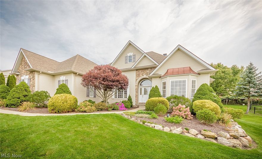Here's an exquisite Pambi Farms Ranch in pristine condition. Custom built by the original owner/builder with careful attention to detail, quality & expert workmanship throughout. Prepare to be impressed by the open concept floor plan as you step into the foyer entry that flows into the formal living room, formal dining room and great room.  All throughout this home you will find  several arched windows,decorative columns, archways, crown moldings, vaulted and cathedral ceilings, beautiful light fixtures and gorgeous hard wood floors. The great room has a 19 ft cathedral ceiling and a gas fireplace. It opens to the custom eat in kitchen with cherry stained cabinets, built in buffet, granite counters & high end appliances plus it steps out onto the new cedar deck porch which overlooks the park-like back yard filled with beautiful flowers and a decorative fish pond. The spacious master suite  also steps out onto the deck and it includes a master bath with a jetted tub, separate shower, do