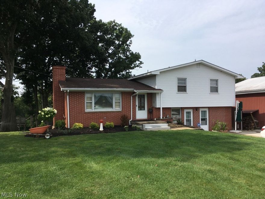 Beautifully updated 3 to 4 bedroom home. 36 x 36 heated garage with 10 ' doors. Updates include: remodeled kitchen, master bath, new propane furnace and heat pump (2016). All house wood burner (2016). Last year only used 1/2 tank of propane. Upper and lower level deck with hot tub. 2 1/2 bath. New central air, new landscaping. Minutes from Atwood Lake or town. Great country setting.