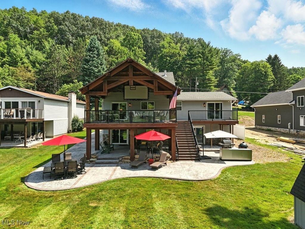 Welcome to your waterside retreat at Lake Mohawk! This beautifully maintained 3-bedroom, 2 full bath home offers an open floor plan with cathedral ceilings, perfect for entertaining or relaxing by the lake. The spacious kitchen features a large granite island and flows into a bright dining area with access to the most amazing covered timber style deck—complete with a projector screen for movie nights or game days.
The main floor includes two bedrooms and a stunningly remodeled full bath with double sinks and a custom tile shower. The primary bedroom boasts direct access to the immaculate bathroom, a large walk-in closet/dressing room, and a private walkout to the covered deck with tranquil views.
The lower level offers a cozy living space with a gas log fireplace, a second updated full bath with an acrylic walk-in shower, laundry room, third bedroom with patio access, and a versatile storage/workshop area. The attached two-car garage is spotless and convenient.
Recent updates include: stamped concrete patio extension, new concrete walkway from driveway, furnace & hot water tank (2019), newer roof over main bedroom, updated gutters, and stylish new driveway lighting. The refrigerator and dishwasher are 3–4 years old.
Lake Mohawk is a private, gated community centered around a 500-acre unlimited horsepower lake. Enjoy boating, fishing, 3 beaches, clubhouse, tennis & pickleball courts, lakefront events, and a 9-hole executive golf course. Whether year-round living or a seasonal escape, this is lake life at its finest!