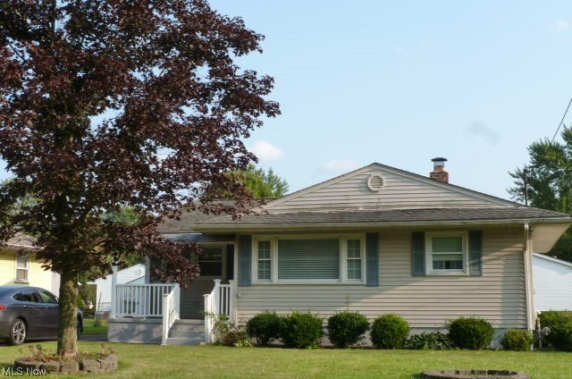 Attractive three bedroom ranch featuring a spacious kitchen/dinette with oak cabinets, granite counter tops and ceramic floor. Cozy living room, hardwood floors, two full baths, and double detached garage.Updates include vinyl replacement windows, furnace and roof shingles. Also, basement walls are poured concrete with glass block windows. Spacious separate area in basement perfect for a future recreation room. Front porch with concrete floor and back patio perfect for a gas grill. Poland Schools.