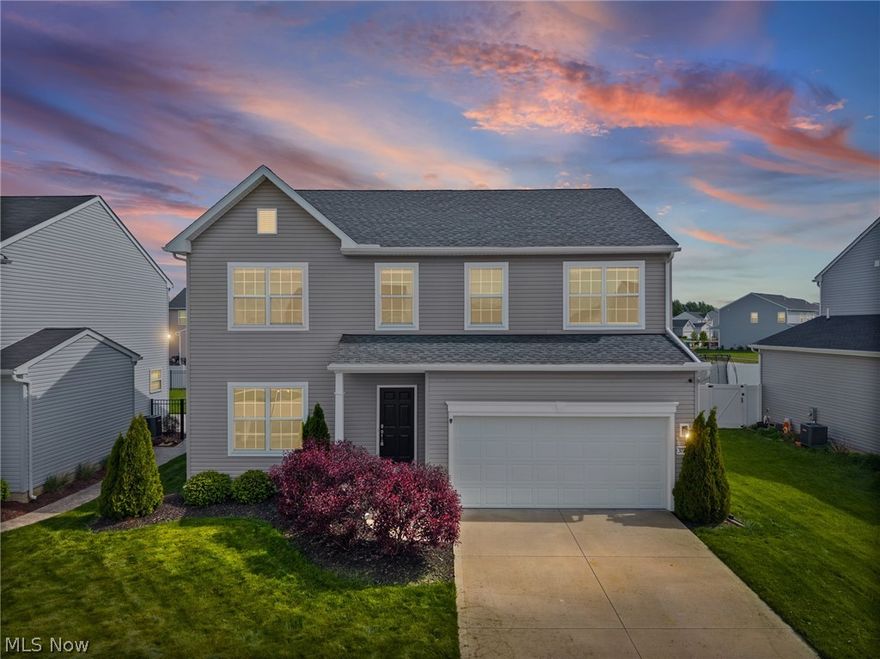 Welcome to 37272 Sandy Ridge Drive—an inviting, move-in ready home that blends comfort, functionality, and modern living in a highly desirable North Ridgeville neighborhood. From the moment you arrive, you’ll notice the well-maintained exterior, clean landscaping, and strong curb appeal. Step inside to a bright and welcoming front living space—perfect for a home office, sitting area, or flex room to fit your lifestyle. The main level opens up into a spacious living room that flows seamlessly into the dining area and kitchen, creating an ideal setup for both everyday living and entertaining. Large windows and a sliding glass door fill the space with natural light while providing direct access to the backyard. The kitchen offers ample cabinet space, a functional layout, and a central island that anchors the space—perfect for meal prep, casual dining, or gathering with guests. Upstairs, the primary suite provides a comfortable retreat with plenty of space, natural light, and an en-suite bath. Additional bedrooms are generously sized and offer flexibility for family, guests, or work-from-home needs. Step outside to a fully fenced-in backyard—ideal for pets, outdoor entertaining, or simply enjoying your own private space. Additional highlights include a two-car attached garage, neutral finishes throughout, and a layout designed for easy living. Conveniently located near shopping, dining, parks, and major highways, this home offers the perfect combination of space, value, and location.