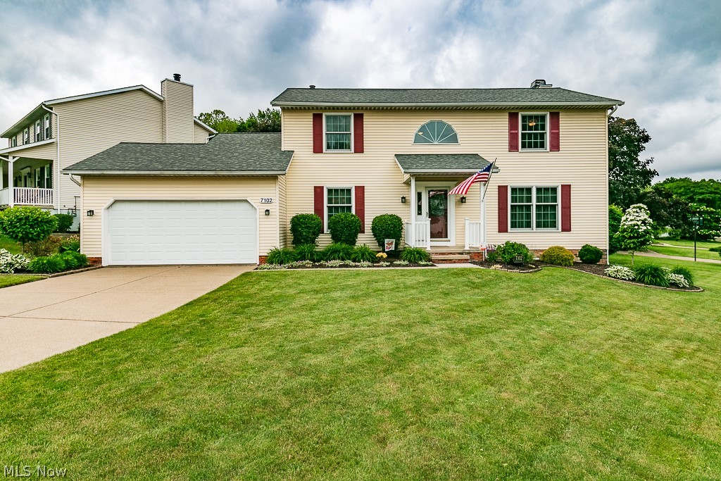 Locaton! Location! Location! Welcome to your dream home! This lovingly maintained 4-bedroom, 2.5-bath colonial in Mentor offers a perfect blend of comfort and elegance. Step into the inviting formal living room, bathed in natural light, providing a warm and welcoming atmosphere. The eat-in kitchen is a chef's delight, featuring a cozy eating area with a bayed window, a versatile island, granite countertops, a planning desk, and stainless steel appliances. The kitchen seamlessly flows into the family room, complete with built-in shelving, ample storage, and a charming gas fireplace. From here, step out through the sliding doors onto the two-tiered, covered TimberTech composite deck- ideal for entertaining guests or enjoying a quiet evening outdoors. For added convenience, the first floor includes a well-appointed laundry room. Upstairs, you'll find four spacious bedrooms, each offering generous closet space. The primary bedroom boasts his-and-her closets and an ensuite bathroom with a walk-in shower and granite countertops. The finished lower level is a versatile space perfect for recreation or relaxation, featuring a game room with a bar area, a separate office space, and plenty of storage in the utility room. An attached two-car garage features nature stone flooring and attic access. The outdoors is well-manicured with gorgeous plants and mature trees. Enjoy this excellent location with walking distance to shopping, restaurants, and all essential amenities. You'll also enjoy the outdoors with several fishing ponds and a large community baseball field and plenty of common area to entertain and play. Don't miss the opportunity to make this home yours!