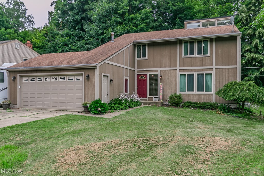 Welcome to this well-laid-out 4-bedroom, 2.5-bathroom home offering plenty of space for comfortable living and entertaining. Located in a quiet, established neighborhood, this home features a thoughtful floor plan ideal for families of all sizes.Upstairs, you’ll find four generously sized bedrooms and two full bathrooms, including a spacious primary suite. All bedrooms offer ample closet space and natural light, providing a cozy and functional retreat for everyone in the home.The main floor boasts two separate living areas—perfect for creating both a formal space and a more relaxed family room—as well as a dedicated dining room for hosting gatherings. The kitchen offers plenty of counter and cabinet space with great flow for everyday living.Step into the 3-season room, a perfect bonus space to enjoy spring, summer, and fall. Whether you're sipping coffee in the morning or relaxing after a long day in the hot tub, this room brings the outdoors in with comfort and charm.Functional layout and great bones, make this home a solid choice for buyers looking to make a space their own.Schedule your private showing today and imagine the possibilities this pet and smoke free home has to offer!