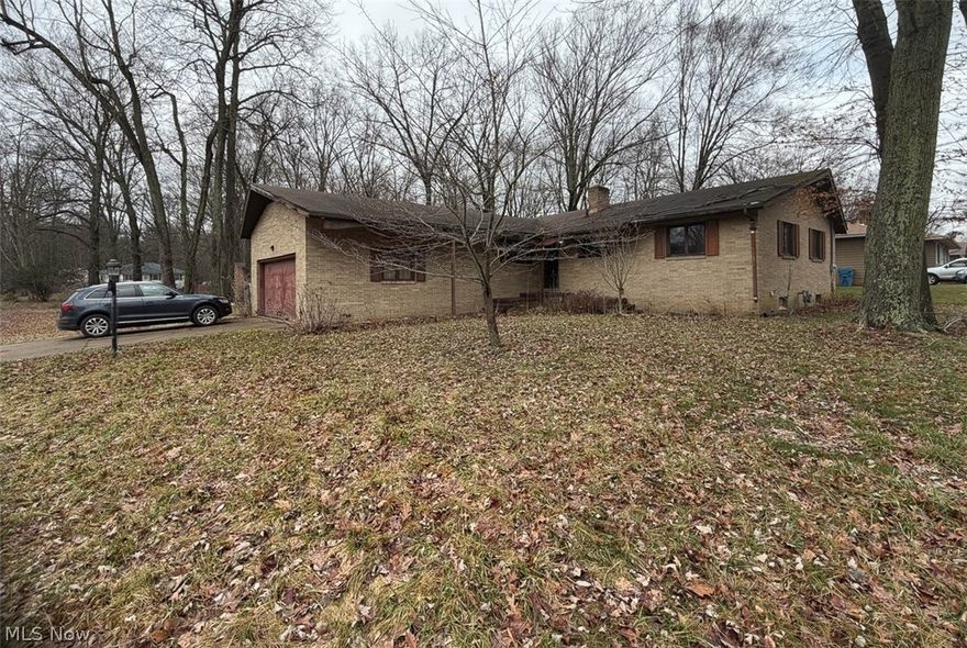 Fixer Upper Brick Ranch Home. Green Local Schools, Summit County. Remodeled Basement Complete. Live Onsite with Online Bidding. All sells to settle the Janet L. Melton Estate. Summit County Probate case #2025 ES 00310. ONLINE BIDDING BEGINS MONDAY, APRIL 13, 2026, AT 9:00 AM, AND AUCTION LIVE ON-SITE BIDDING WILL BEGIN TUESDAY, APRIL 14, 2026, AT 12:30 PM. Brick ranch home built in 1964, situated in Green City within the Green Local School District. Home offers 1,533 sq. ft. of living space featuring 3 bedrooms and 2 full baths, including a private bath in the primary bedroom. Main level in need of updates. Spacious living area, hardwood floors throughout. Attached 2-car garage and small outbuilding with single-car garage door. Full basement that has been completely remodeled and waterproofed with a double utility sink, laundry hookup, gas/wood-burning fireplace, and stairway to the garage. Updates include a new gas furnace, new A/C, and a new hot water tank (2026). City water & septic. Property shaded by large mature oak trees. 2025 real estate taxes are $4,265.72. Summit County parcel no. 2804275. The property will be open for preview on auction day, starting at 11:30 AM.