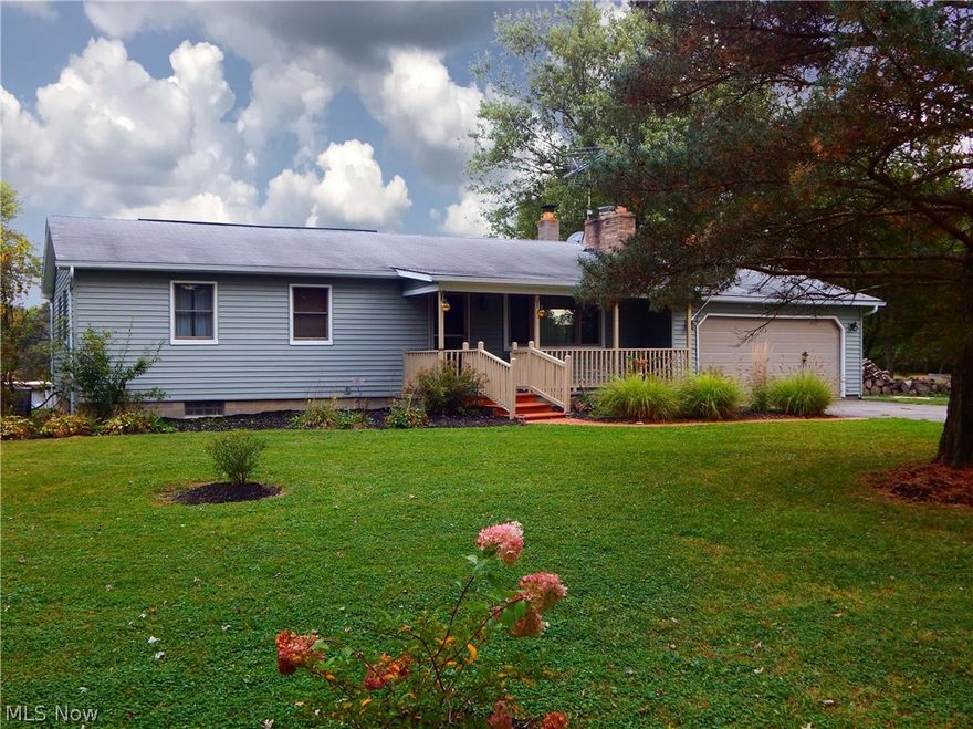 This 3 bedroom, 1.5 bath Ranch is set back on wooded 5.64 acres.  Inviting front porch that leads to the spacious living room.  Kitchen has plenty of cabinet space and sliding doors out to the backyard patio and deck.  Dining room perfect for entertaining.  Hot tub in an enclosed gazebo with a TV and surround sound.   Above ground pool.  Wood-burner tied to duct work.  2019 updates include: siding, flooring, painting, doors, trim, basement, deck, and sunroom/3 season room finished.