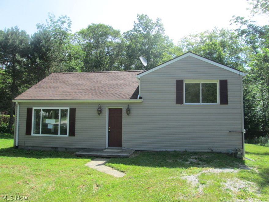 Fantastic opportunity.  Three bedroom two full bath split level with large deck overlooking wooded backyard.  Vinyl siding, vinyl replacement windows, glass block windows, a first floor master bedroom, central air and much more. Call today.  Great value.