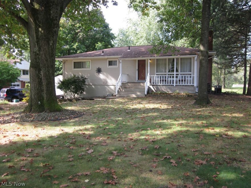 Enjoy this friendly and quiet neighborhood offering high level pride of ownership very unique 3 to 4 bedroom perfect size ranch completely updated with new a kitchen and baths. Enjoy the park like setting from the nice deck out back. Down stairs you will see a new full sized in-law suite or use it as a spacious oversized recreation room that even has its own private entrance. 2 Car garage concrete driveway, nice big lot with an additional heated 20 X 20 private workshop art studio.