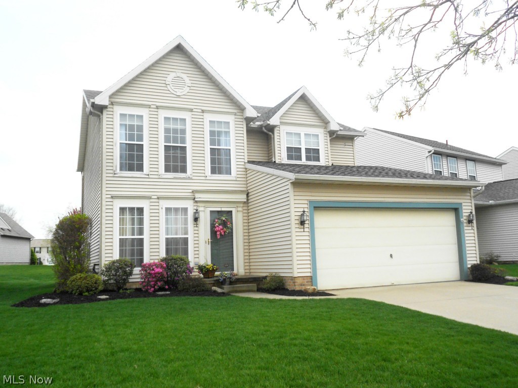 Beautiful colonial in desirable Coventry Crossing. Sharp 4 bedroom, 2.5 bath home is well maintained with stylish decor and pottery barn colors. An eat-in applianced kitchen plus a dining room and formal living room create a warm and inviting atmosphere. The cozy family room has easy access to the kitchen and leads to the patio for entertaining family and friends. Master bedroom with lots of natural light, offers a walk-in closet and bath with double sinks and garden tub. Convenient second floor laundry (washer & dryer included) makes doing the wash less of a chore. Roof was replaced (tear off) in 2014. This family oriented neighborhood features a great community park with splash path and planned events.
