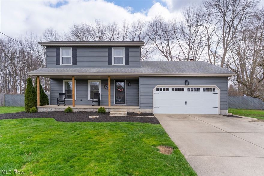 Welcome to 545 Meadowland Ct, a well-maintained two-story home tucked away on a quiet cul-de-sac in the desirable Hubbard School District. Offering 3 bedrooms, 1.5 bathrooms, and a functional layout, this property blends comfort, space, and outdoor enjoyment. A welcoming front porch leads you into the main living area, creating a warm first impression. The spacious eat-in kitchen features wood cabinetry, laminate countertops, and a dedicated dining area with direct access to the back deck, perfect for everyday living and entertaining. The main floor also includes a convenient half bath and a cozy family room highlighted by exposed wood beams and a fireplace, with access to a screened-in porch overlooking the backyard and pool area. Upstairs, you’ll find three generously sized bedrooms, each with ample closet space. The full bathroom has been updated with a double vanity, a tiled walk-in shower, and a modern Bluetooth speaker/light combo for added comfort and convenience. The partially finished basement offers additional flexible living space, ideal for a rec room, playroom, or home office, along with a laundry area and extra storage. Step outside to a fully fenced backyard designed for enjoyment, featuring an in-ground pool, a small basketball court, and plenty of room to relax or entertain. An attached two-car garage completes this well-rounded property. This home offers a great combination of indoor comfort and outdoor amenities in a prime location, don’t miss the opportunity to make it yours