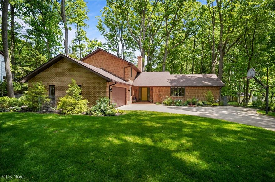 Here's a custom built brick home in Silver Lake Village with a unique and impressive floor plan which has been updated and maintained in pristine condition! From the foyer entry, you'll find that  the newly reconfigured  open concept design encompasses the following: A carpeted sunken living room with a sandstone gas fireplace, gorgeous hardwood floors that continue throughout the beautifully remodeled kitchen, dining room and a sitting area with a bay window view. The first floor also has a large family room with  a beamed ceiling, wood burning fireplace and sliders to the patio, hot tub and beautifully landscaped backyard. There is also an office or 4th bedroom, full bath and first floor laundry that  completes the first floor. Upstairs there are 3 more spacious bedrooms and 2 full baths including the master suite with private bath and walk in closet. The decor is tastefully done and charming throughout.   Extensive updates all since 2023 include the following: All three bathrooms have new cabinets, quartz counters, new fixtures and floors. New Lennox HVAC! All interior painted, new light fixtures, new carpet in bedrooms, all new Bali blinds, washer and dryer too! Landscaping has been  refreshed and leaf guard added. The basement has plumbing to add a bathroom. As a resident of Silver Lake Village you may opt to join Crystal Lake for swimming, fishing ,boating or picnicking. Or there's ball fields, tennis courts and hike and bike trails along the Cuyahoga River.  This is a  wonderful opportunity to have such a well cared for home and to  live in and enjoy all that Silver Lake Village has to offer.