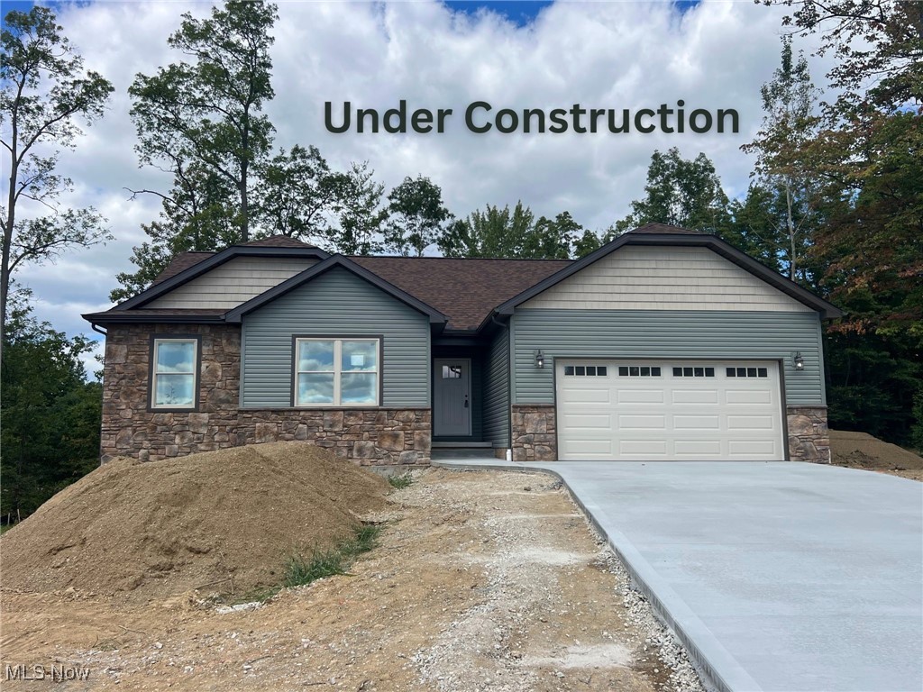Under Construction NOW with September 2025 completion - New, energy efficient, open ranch plan on walkout cul-de-sac lot in desirable Camden Meadow, Perry Township from Williams Custom Homes. Cottage style home design with split bedroom plan offers exclusive one-floor living. Master suite with walk-in closet, 5-foot walk-in shower and double vanity. Large foyer & vaulted great room; first-floor laundry; 12-course full basement with walkout; kitchen with lots of cabinets and deep drawers and also includes center island/bar and pantry that is open to dining and great room, all with vaulted ceilings. Home includes partial stone front with nice deck overlooking the partially wooded back yard. Full basement perfect for future living space or recreation room, plus 2-car garage. 30-year GMX dry basement warranty. Amazing opportunity to own a new home in this convenient Perry Township location and features beautiful newer homes. Third of an acre lot and includes all underground public utilities including water, sewer, natural gas and electric. Nice paved streets with storm sewer. Last lot in Camden Meadow located in the Perry Local School district. Still time to choose some lighting and hardware. Contact agent for a private showing today! Agent interest.