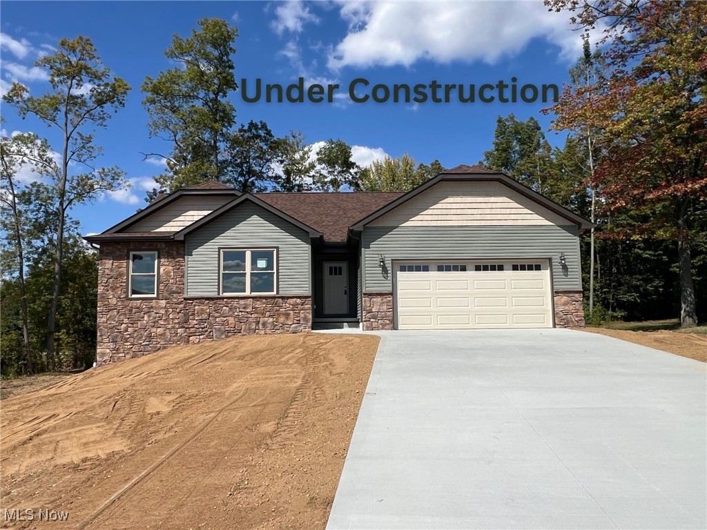 Under Construction NOW with September 2025 completion - New, energy efficient, open ranch plan on walkout cul-de-sac lot in desirable Camden Meadow, Perry Township from Williams Custom Homes. Cottage style home design with split bedroom plan offers exclusive one-floor living. Master suite with walk-in closet, 5-foot walk-in shower and double vanity. Large foyer & vaulted great room; first-floor laundry; 12-course full basement with walkout; kitchen with lots of cabinets and deep drawers and also includes center island/bar and pantry that is open to dining and great room, all with vaulted ceilings. Home includes partial stone front with nice deck overlooking the partially wooded back yard. Full basement perfect for future living space or recreation room, plus 2-car garage. 30-year GMX dry basement warranty. Amazing opportunity to own a new home in this convenient Perry Township location and features beautiful newer homes. Third of an acre lot and includes all underground public utilities including water, sewer, natural gas and electric. Nice paved streets with storm sewer. Last lot in Camden Meadow located in the Perry Local School district. Contact agent for a private showing today! Agent interest.