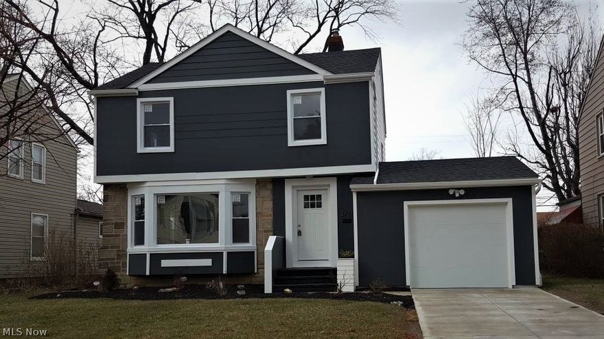 Get your offer in before someone else sees this home! This home will not last!! **Stunning***Open Floor Plan. Beautiful Colonial in a quiet South Euclid neighborhood near shopping, dining and many more amenities. You'll feel proud to turn into your new driveway once you own this home! It's crisp, colorful and has beautiful and easy to maintain landscaping.  **Warm refinished hardwood floors and a stunning picture window.  The living room is open to the dining room, kitchen and additional bonus family room. Kitchen has a Custom Quartz peninsula, built-in stainless steel dishwasher and all new Custom Designed cabinetry.  Bonus room leads to backyard and private patio area.  Upstairs has master bedroom, 2 additional bedrooms and New Bath w/nearly 50 inches of counter space! There is a 1/2 bathroom on the 1st floor and a carpeted finished basement for more entertainment space. This home has New Roof, New Windows, New Exterior Doors, New Kitchen, New Baths, New A/C, Updated Elect, New Concrete Drive, Basement Waterproofing and an Attached Garage with access directly into the home.  Imagine leaving for work without scraping ice from your windshield!  **Too many updates to list. Schedule your showing today!