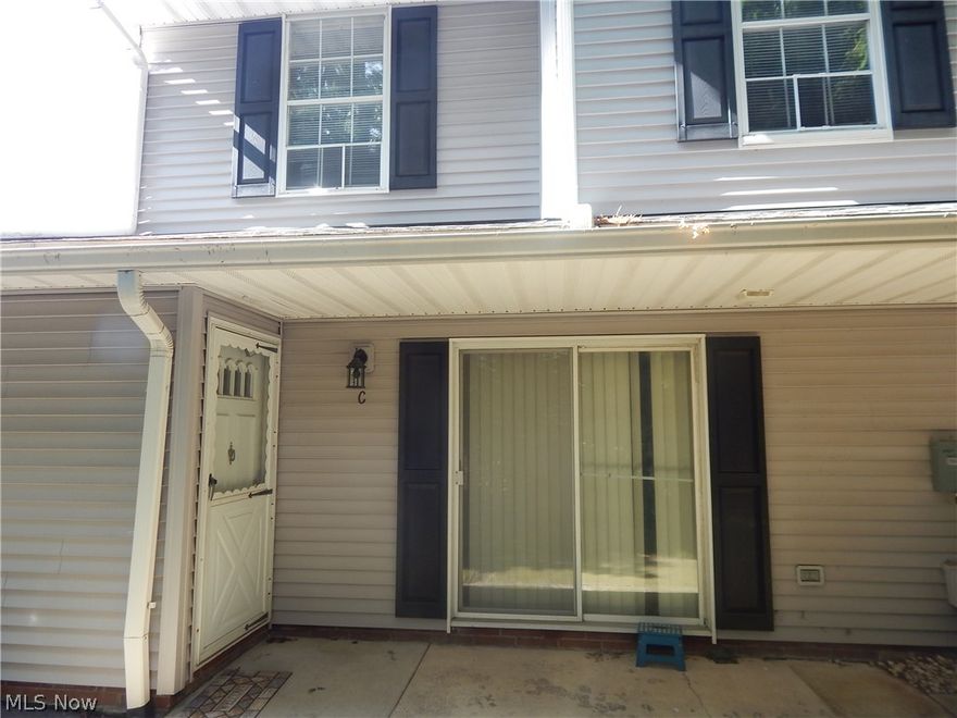 Welcome home! Great Opportunity to put updates and touches on this condo.  In the spacious living area, many options exist. All appliances in the kitchen stay including washer and dryer. The main floor offers the option for a primary suite or additional living area with a  wood-burning fireplace. The additional bedrooms and bathroom complete the upstairs. This condo association is a winner for sure as there's a heated pool, tennis/pickle ball courts, clubhouse, and playground area for owners to enjoy! Don't miss out on your chance to own a slice of paradise! This condo is being offered for Estate Sale. Needs TLC and updates. Great value for the handy person. Private rear patio, attached garage.