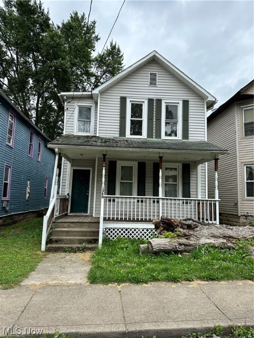 This home needs some work, there is one bathroom, and a toilet in the laundry room.  Parking on the road, with alley access parking.  Home is sold AS IS
