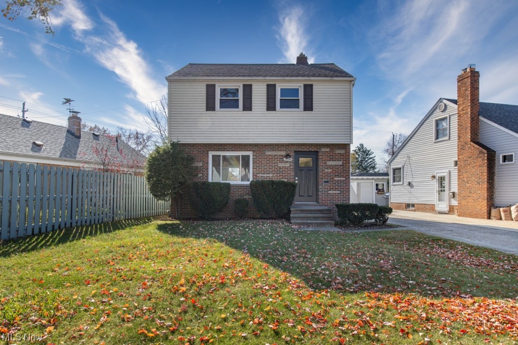 A beautifully renovated Contemporary Colonial Home that harmoniously blends traditional charm with modern design. This home features three comfortable bedrooms and a renovated full bathroom. Upon entering the home, you will be greeted by impeccable hardwood floors that run throughout the house, effortlessly connecting the various spaces. Every culinary enthusiast will fall in love with the brand new kitchen. Boasting stunning quartz countertops, new stainless steel appliances, and a large window over the sink, allowing for an abundance of natural light to flow through. The pristine condition of the kitchen highlights the level of care invested into this comprehensive renovation. The bathroom follows suit with a sleek and modern renovation, and you'll certainly appreciate having the convenience of a washer and dryer on the top floor. As you wander through this inviting home, you'll notice also the new doors and modern lighting fixtures which add a touch of contemporary elegance. Heading downstairs, the basement offers a versatile space for work or play, its semi-finished state presenting an exciting opportunity to shape it to your desires. Experience the joy of living close to nature as this home is only a short stroll away from serene Lake Erie. With a variety of fantastic restaurants and shopping at hand, enjoy the comfort of having amenities close by.