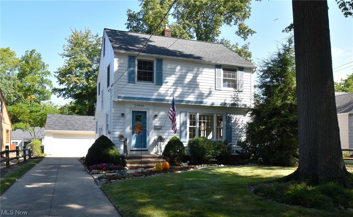Loving Lake Life in Bay Village!! Welcome home to this abundantly charming 3 bed/ 1.5 Bath Colonial! Exceptional landscaping greets you! New sconce lighting and address numbers at the entrance. Freshly painted exterior on driveway and newer ultra long Driveway. Beautiful craftsmanship details throughout this home. Hardwood floors under the carpet, plus stunning wooden banister and doors. Bedrooms are a great size and upstairs bath recently received a new tub-surround. Updated vinyl windows throughout the home, letting in lots of light! Living room opens to a large elegant dining room with coved ceiling and stunning trim. Eat-in kitchen with Bay Window, ample cabinetry, stained glass, and a great layout. All appliances stay. Powder room on the first floor. Sunroom/enclosed rear porch is a perfect place to relax! Yard is an oasis! 2.5 car garage. Oversized AC unit is newer. Basement offers a finished Rec side, and the utility side boasts laundry, a workshop area, and tons of storage! This home is 1 block from the Lake plus close to dining, shopping, hospitals, and the fantastic recreational offerings of the City of Bay Village. Seller is generously offering a 1 year home warranty for the Buyer's peace of mind. Please enjoy our attached video tour and request your private showing today!
