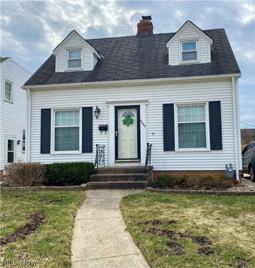 Be the first to see this charming, impeccable home! Features first floor family room, beautiful hardwood floors, fireplace, ceiling fans throughout, details galore, appliances including a freezer in the basement, 2 full baths, oversized 2 car garage with opener, concrete drive with extra space for parking, nice size yard for the kids. This home will not last!