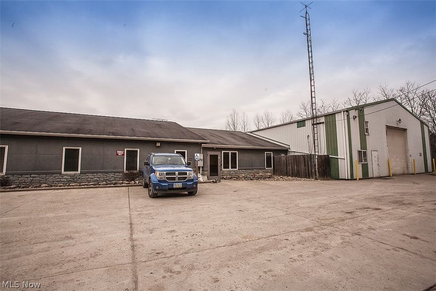 Great warehouse and office space just three minutes from I-70.  Two commercial buildings on 3.3 acres.  Main building has large garage and 12 modern rooms including meeting rooms and offices.  Men's and Ladies' restrooms.  Second building has a large garage and lots of storage room including a loft area. Plenty of parking.  Seller to retain mineral rights.