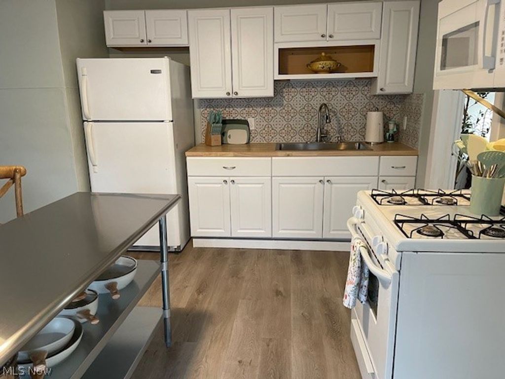 Photo of 1942 E 120th Street, Cleveland, OH 44106 (MLS # 5212289)