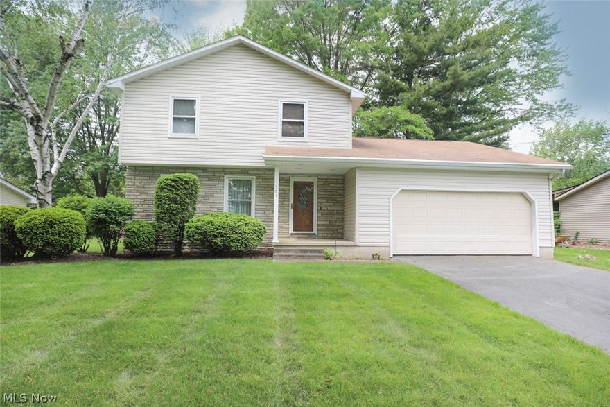 Awesome 3 Bedroom/2 Full Bath Colonial with Private Backyard.   Home Features Include:  First Floor:  Large Front Living Room, Awesome Back Family Room with Gas Fireplace, Custom Kitchen with Oak Cabinets & Breakfast Area, Formal Dining Room, & Amazing First Floor Laundry Room/Full Bath.  Second Floor:  3 Large Bedrooms with Stunning Hardwood Floors & Full Bath.  Basement was Waterproofed by Ohio State Waterproofing in 2005 with Transferrable  Warranty.  Front & Back Yards have been Professionally Landscaped and offer a Beautiful Stone Patio, Wonderful Landscaping, and Awesome Night Lighting that makes the house Glow at night!  Updates Include:  New Vinyl Siding - 2011, New Roof - 2011, New AC - 2000, New Furnace - 2000, Updated Electric - 2000, New Hot Water Tank - 2015, Stainless Steel Refrigerator - 2015, & New Front Door & Storm Door.