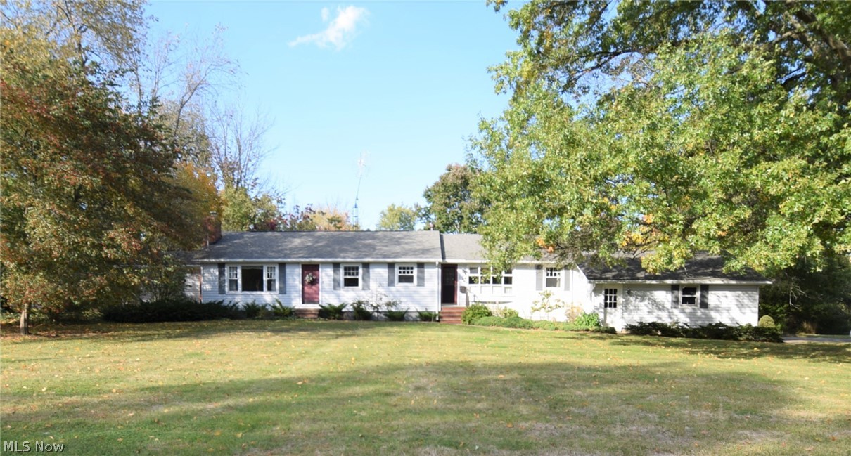 Welcome to 9145 Portage St. NW! This is your opportunity to own a 3-4 bedroom ranch on a private park like parcel with an unbelievable backyard! This home is a must see! The house as a large master bedroom with a large walk-in closet and spacious master bathroom and doorway leading to the deck on the back. Spacious kitchen with eat-in area and a separate dining room! The potential 4 bedroom, formal dining room and family room could be used as a separate suite has it has a full bathroom and a separate door that also leads to the back deck. Two car garage and a spacious 14x20 outbuilding perfect for storing everything you'll want to enjoy this gorgeous backyard! Newer roof with dimensional shingles, newer furnaces and a/c, this home is ready to go! Call to schedule to your showing today before it's sold!