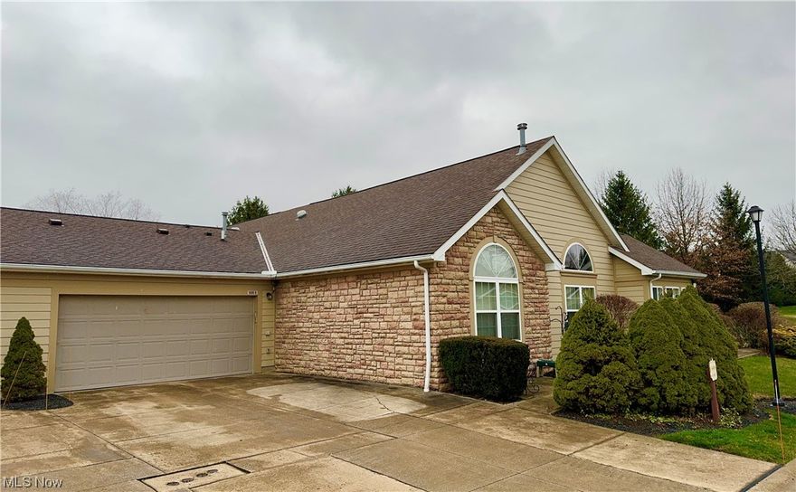 Lovely Solon ranch condo in 50+ senior living community.  This ranch-style condo boasts a wonderful abundance of natural light throughout the unit.  Open floor plan with vaulted ceilings.  The living area features large windows that allow sunlight to stream in. The eat in kitchen has ample cabinet space featuring corian countertops with appliances included.  The Owners suite has an attached bathroom along with a large walk in closet.  The two car attached garage features loads of storage.  Ready for immediate possession.