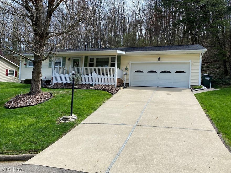 Beautiful MOVE-IN ready ranch home in a cul-de-sac. This home has everything and is in pristine condition. 3 bedrooms + full bath + eat in kitchen + living room all on main floor. Kitchen has granite countertops with stainless steel appliances. Off the eating area you will enjoy the enclosed sun room. A prefect place for mornings and evenings...having coffee, cocktails and reading a book. Original hardwood floors in most rooms. New flooring in others. Downstairs you will find an entertaining room, complete with pool table and small bar area. Also, downstairs is a half bath and laundry room together plus a cedar closet! Oh and the fanciest laundry chute ever! Basement has been B-dried. This home has so many updates...newer furnace, windows, roof, siding, and AC. Garage, yep...truly a 2 car attached garage. Outside you will find a stamped patio with a small fenced in area to keep your small fur-babies safe. Outside landscaping is beautiful when in full bloom. Seller is offering a 1 year