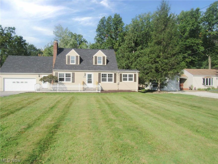 Great Opportunity to Purchase a beautiful home on almost an acre and a half of land. Property is freshly redone inside and out. Large rear patio and deck with brick barbeque and fire pit. Garage with separate driveway with large garage door. It has finished rooms in it that could be a Man Cave or craft room or even an in-law suite because there is a full bath inside the garage as well. The property is across the street from a golf course and has a large vacant lot next door to it as well. All of this and I have not even spoken about the interior. Cherry Kitchen, New appliances, New furnace and AC and finished rec room in the Basement are just a few of the highlights of this home. This is a once in a great while opportunity for you to own your Slice Of Paradise. BE FIRST OR BR SORRY ON THIS ONE!