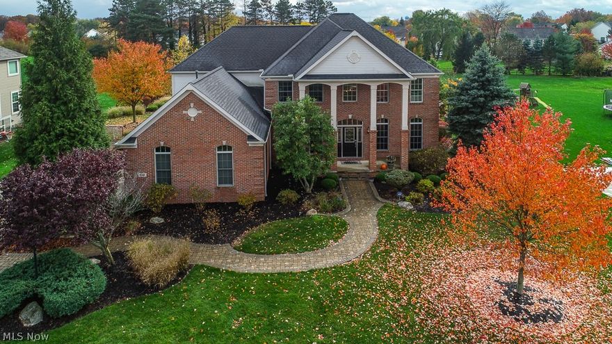 Custom built Dutch Home Builders former model home! Over 5700 sqft includes recently finished lower level. Stunning 2 story entry, large great
rm w/ fireplace & wall of windows to the lush backyard w/ gorgeous paver patio & hot tub. Extra large kitchen w/ Kraftmaid cabinets, Corian
counters, cooktop island, breakfast bar & large eat-in area full of windows with slider to outside. Kitchen has a shared fireplace w/ great rm.
Formal dining rm, office w/ built-in bookcases & half bath on main floor. 1st floor master suite is a relaxing retreat w/ a fireplace, sliders to
outside, 3 walk-in closets & ensuite glamour bath w/ double sinks & steam shower. Laundry room is also on the main floor. Extra large 3 car
heated garage w/ AC & nature stone flooring. Open staircase to the 2nd level where there are 3 additional nicely sized bedrooms and a large loft area overlooking the great rm but has custom barn doors to close off this area to create a 4th bedroom, office or teen suite. Two full
J