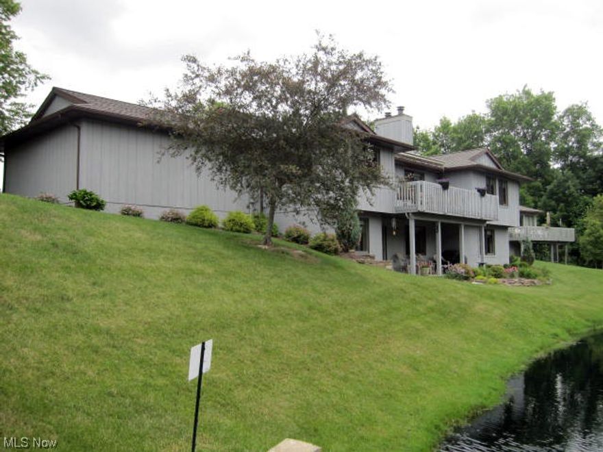 Absolutely Gorgeous ranch condo that is free standing and has a magnificent pond and natural wooded setting. This home has been completely updated since owners purchased with granite in kitchen and all stainless appliances. All lighting fixtures replaced. Beautiful hardwood floor in kitchen, dining room and entry. Kitchen has floating island w/ matching granite. Unfinished part of basement and garage have Nature stone flooring. Furnace (high efficiency) & air conditioning new in 2013. Basement waterproofed in 2014 with Lifetime Transferrable warranty. New carpet in 2013 throughout. Baths updated with vanities and Corian counters. New Tile floor in Master. Washer & dryer new 2012. Association replaced roof in 2013. Annual window washing , pool and clubhouse, cable included plus snow removal. Landscape a Must See!