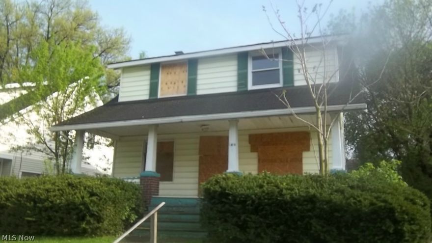 3 bedroom, living room and dining room. 1 car detached. Covered front porch.