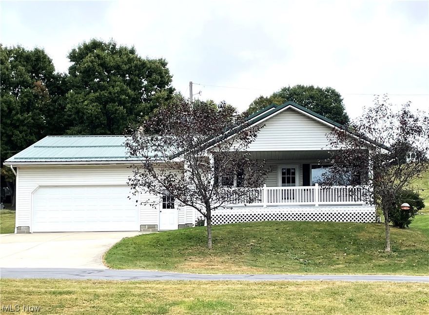Easy living to be found in this charming, 3BR-2BA ranch home, with 2 car attached garage!  Built in 1999 this home features an eat-in- kitchen with nice oak cabinetry, skylight and all appliances remain.  Lead on to the spacious living room with neutral carpet, which is open to the kitchen enough to allow socializing between the 2 rooms.  Head back the hallway and you will find a full bath which contains the laundry area, washer/dryer are included.  The 3 nice sized bedrooms are located to the rear of the home and all feature neutral carpet, and spacious lighted closets.  There is another bathroom in between the 2 rear bedrooms.  There is a full basement under the main part of the home with a cemented crawl space under the rear bedroom.  The basement offers tremendous storage and could be finished if you desire additional living area.  Add in the covered front porch for relaxing, an automatic start generator which will run most of the home, and you have a complete package for easy living in this very well-maintained home!