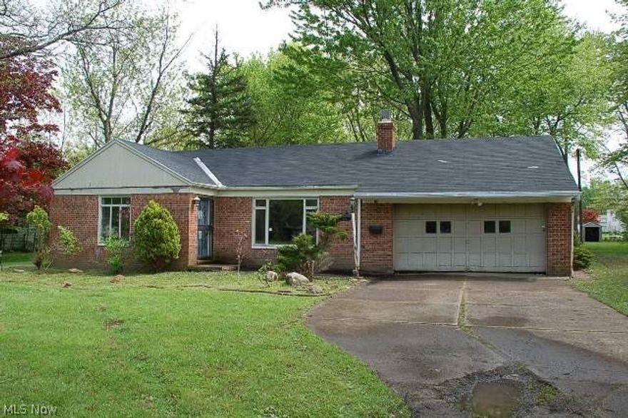 Beautiful half acre lot, great location within walking distance to the Metroparks...this home is in the perfect place, just not the greatest condition.  Bring your vision to overhaul the kitchen, flooring, bathroom, mechanicals, some drywall skills, maybe even an addition to increase the footprint...plenty of potential.