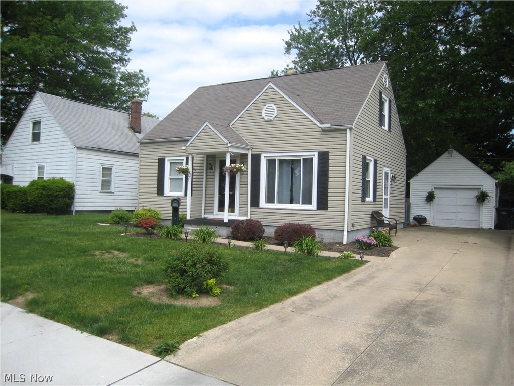 Charming Cape Cod with finished basement featuring a family room, bar, and a recreational area. Perfect for entertaining and everyday living. Sparkling kitchen with eat in area that overlooks the back yard with patio. Living room with picture window. 2 bedrooms and an updated bathroom on the main level. 3rd bedroom with walk in closet on the upper level. Treed back yard with patio create an outdoor area for you to relax with privacy. 1 car garage. Convenient location to Portage Crossing, entertainment, restaurants, and major highways.