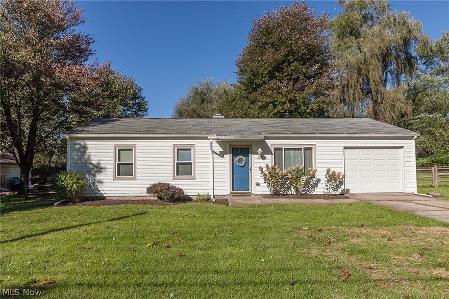 Nice ranch home on a dead end street in Kent, Ohio is an easy walk to both Stanton Middle School and Theodore Roosevelt High School and feels like a home in the country. (Yet taking in an TRHS football game or Stanton event couldn't be easier!) Enjoy the spacious, flat, fully-fenced back yard (with wooded acreage behind) and the large kitchen windows that not only let in natural light but also provide a great view of the back yard. Well-appointed use of wood laminate flooring runs through the main living area, 2017. New bath fixtures in 2017 as well as fresh paint in several areas, 2017/18. MABR has direct access to bath. Attached garage with entry to kitchen makes for convenient stowing of groceries. Fishcreek Park, with playground, soccer fields and walking trails is at the end of McKinney and one of Kent's hidden neighborhood treasures!  List of updates included in MLS Supplements. One-year home warranty paid by seller for buyer peace of mind!